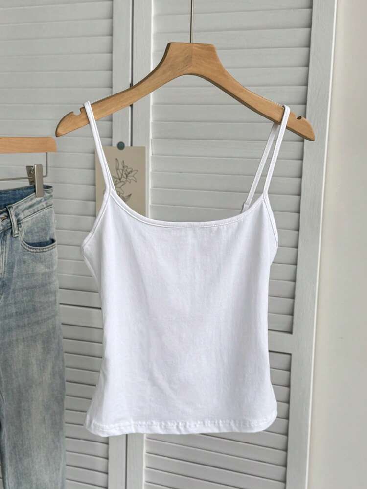 White Spaghetti Strap Sleeveless Camisole Tank Top (Category: Blouses) located in Quezon City. Submitted by snooop (Listing ID 1453615363, Image 2). Description: RFS: declutterring 〰️ fits XS-S frame 〰️ cute & dainty european summer or basic top! 〰️ light and stretchy fabric with adjustable straps 〰️ no flaws.