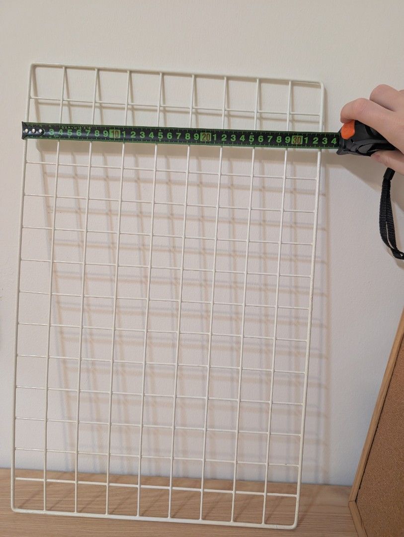 Wire grid panel (Category: Home Improvement Tools & Accessories) located in Singapore. Submitted by hellojiaaaaaa (Listing ID 1453576701, Image 3). Description: versatile wall organizer 50cm x 33cm.