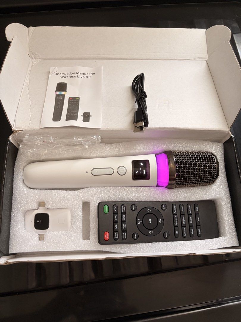 Wireless Live Microphone Kit with Remote and Adapters (Category: Microphones) located in Antipolo. Submitted by daddywill (Listing ID 1453501072, Image 1). Description: - Wireless live microphone kit - Includes microphone and remote control - Comes with various adapters - Features colorful lighting effects - Ideal for karaoke and live streaming - Simple to connect and operate - Instruction manual provided.