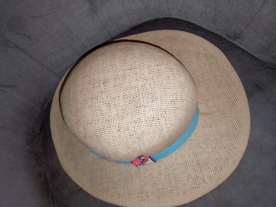 Woven Straw Sun Hat with Blue Ribbon (Category: Hats & Beanies) located in Binangonan. Submitted by yuristalin888 (Listing ID 1453453012, Image 3). Description: - Lightweight woven straw hat - Features a bright blue ribbon band - Wide brim for excellent sun protection - Blue interior lining - Ideal for beach days and summer outings - Easy to pack and wear.