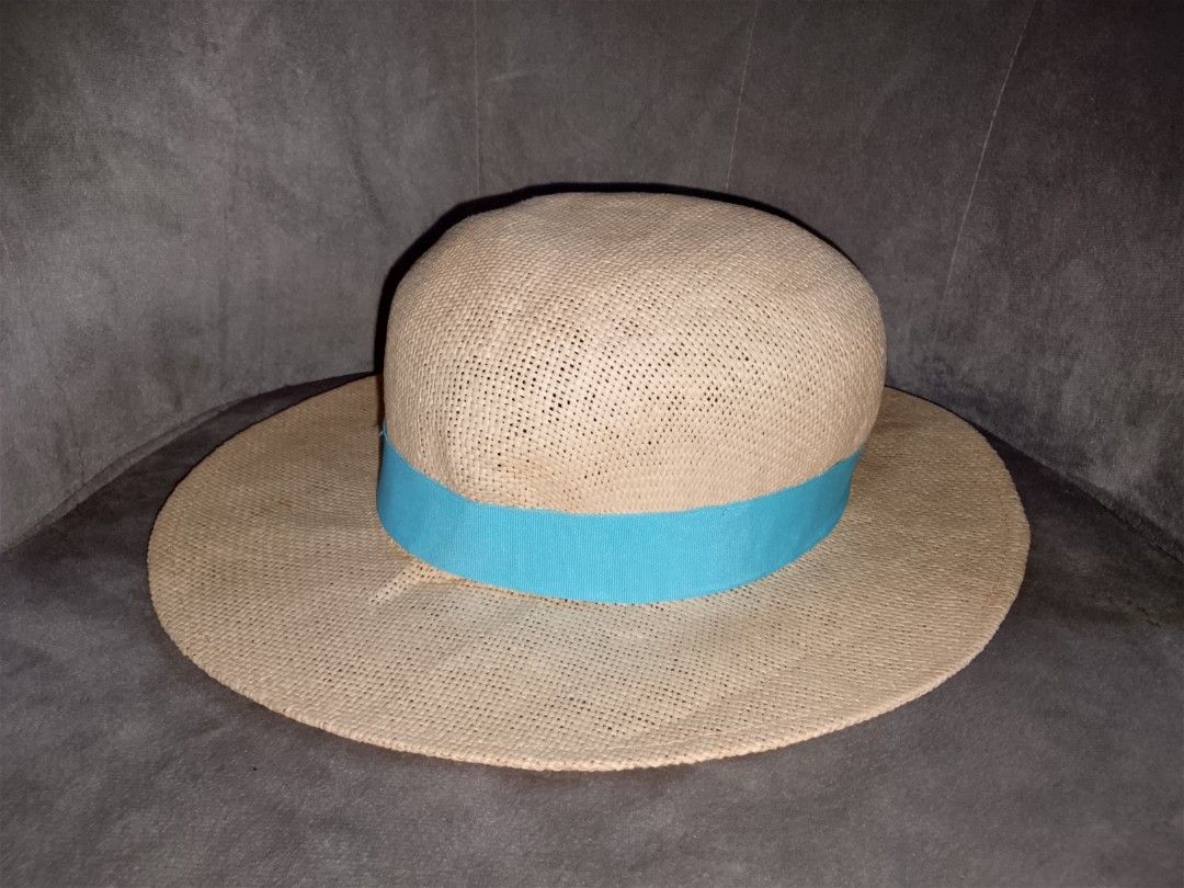 Woven Straw Sun Hat with Blue Ribbon (Category: Hats & Beanies) located in Binangonan. Submitted by yuristalin888 (Listing ID 1453453012, Image 1). Description: - Lightweight woven straw hat - Features a bright blue ribbon band - Wide brim for excellent sun protection - Blue interior lining - Ideal for beach days and summer outings - Easy to pack and wear.