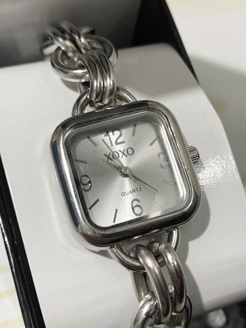 XOXO Bracelet Watch (Category: Women's Watches) located in Quezon City. Submitted by sevenkatenine (Listing ID 1453542530, Image 2). Description: Original XOXO Women’s Charm Bracelet Watch, Quartz Analog, Silver-Tone Removed XO and heart charms as a personal style choice (no longer included). Battery needs replacement. Used fewer than 5 times. .