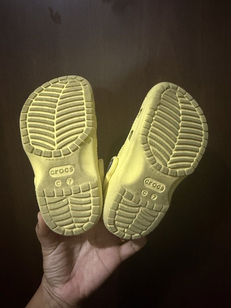 Yellow Crocs with Space Charms - Size C7 (Category: Babies & Kids Fashion) located in Mandaluyong City. Submitted by jenvm (Listing ID 1453491771, Image 2). Description: - Yellow Crocs - Size 7 - Decorated with fun space-themed Jibbitz (planets, astronaut, UFO) - Great for casual wear or for kids who love space.