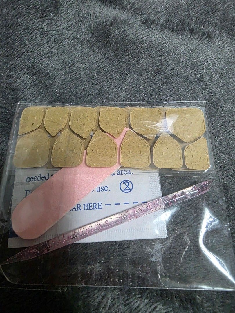 Zhuo Ya Press-on Nails with Flower Design (Category: Hands & Nails) located in Manila. Submitted by jajaye (Listing ID 1453594496, Image 2). Description: - Brand: Zhuo Ya - Type: Press-on Nails - Size: Medium - Shape: Short oval - Quantity: 10 nails per set - Design: Cute floral pattern with pearls and rhinestones - Included Accessories: Nail glue tabs, nail file, cuticle pusher - Application: Easy and quick for a professional-looking manicure - 
