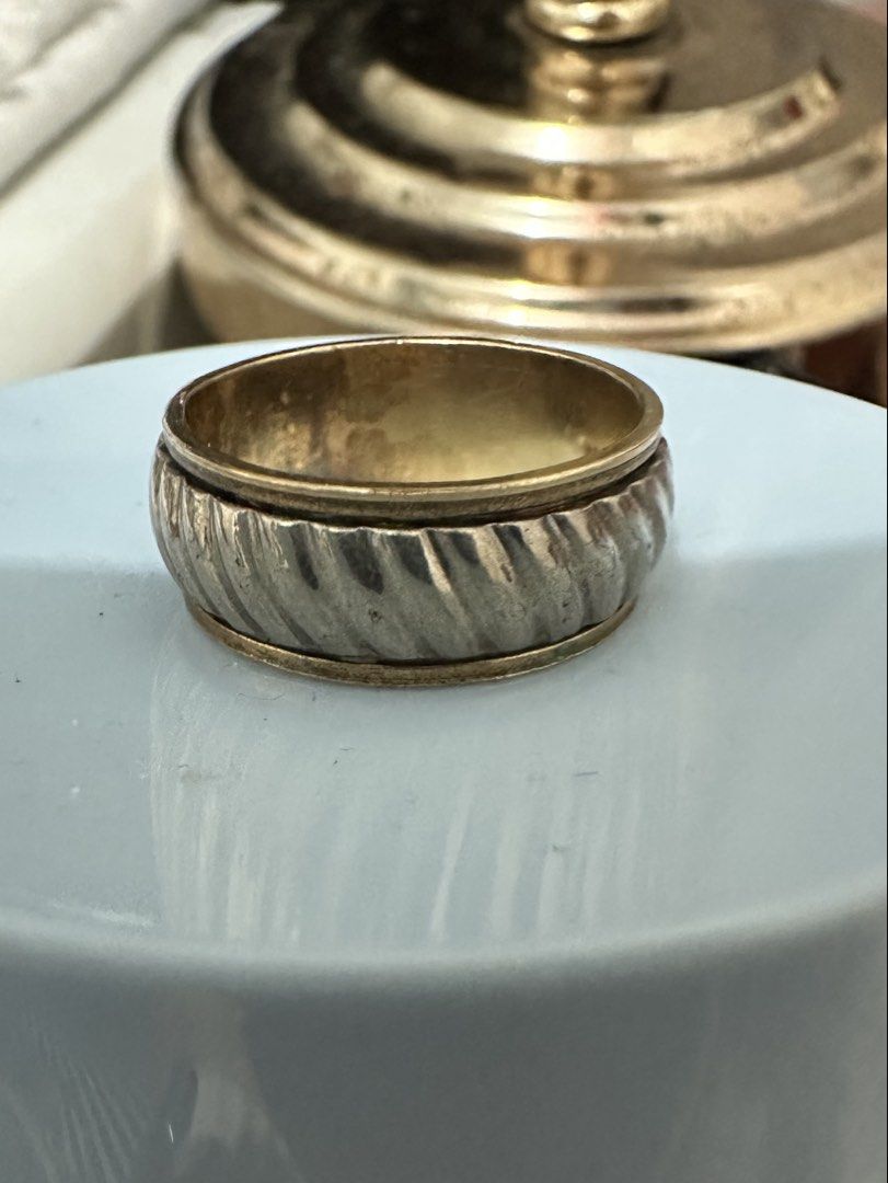 10K GF Spinner Ring (Category: Rings) located in Binan City. Submitted by maydenseven2006 (Listing ID 1458684716, Image 2). Description: - Gold tone spinner ring - Textured outer band - Stamped 1/20 10K G.F. MIK inside - Unique design - Perfect for fidgeting or as a stylish accessory.