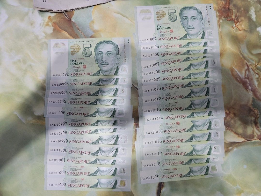 $5 Notes (Category: Currency) located in Singapore. Submitted by mr.tan99 (Listing ID 1458622939, Image 3). Description: $5 notes Condition: UNC 200pcs FV $1000 Selling @ $1050 Many identical and running number..