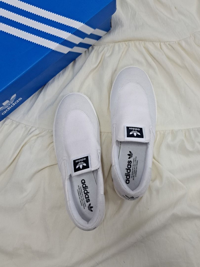 ADIDAS stan smith white slip on shoes (Category: Sneakers) located in Pasig City. Submitted by liderngtatlongbibe (Listing ID 1458618148, Image 1). Description: RFS: decluttering; need fundss ✨️ DETAILS - (brand new) never used, only tried on to fit - good for casual errands day - easy to wear - just a bit dusty on the sole bcs of storage - best fit size 8 *og price: php 4,300 🐥 feel free to ask for additional pics / questions about items ❗️REMI