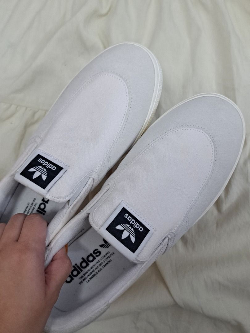 ADIDAS stan smith white slip on shoes (Category: Sneakers) located in Pasig City. Submitted by liderngtatlongbibe (Listing ID 1458618148, Image 3). Description: RFS: decluttering; need fundss ✨️ DETAILS - (brand new) never used, only tried on to fit - good for casual errands day - easy to wear - just a bit dusty on the sole bcs of storage - best fit size 8 *og price: php 4,300 🐥 feel free to ask for additional pics / questions about items ❗️REMI