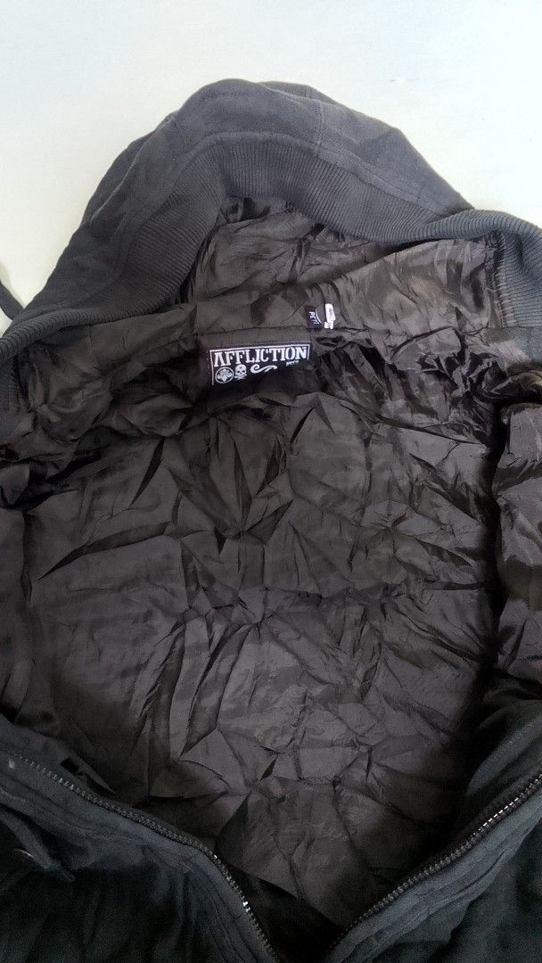 Affliction Black Zip-Up Hoodie Jacket (Category: Coats, Jackets and Outerwear) located in Malilipot. Submitted by santosbolofer (Listing ID 1458591091, Image 3). Description: Affliction Hoodie Small man Length 25.5 Width 21 Verygood condition 9/10 colorate 750 plus sf. Loc. Bicol.