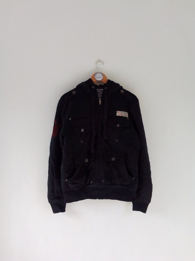 Affliction Black Zip-Up Hoodie Jacket (Category: Coats, Jackets and Outerwear) located in Malilipot. Submitted by santosbolofer (Listing ID 1458591091, Image 1). Description: Affliction Hoodie Small man Length 25.5 Width 21 Verygood condition 9/10 colorate 750 plus sf. Loc. Bicol.