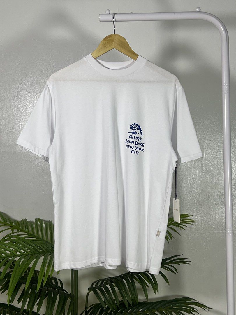 Aime Leon Dore Goddess Tee (Category: Tshirts & Polo Shirts ) located in Las Pinas. Submitted by thriftstax (Listing ID 1458683995, Image 1). Description: excellent pristine condition with hang tags medium on tag 22x27.