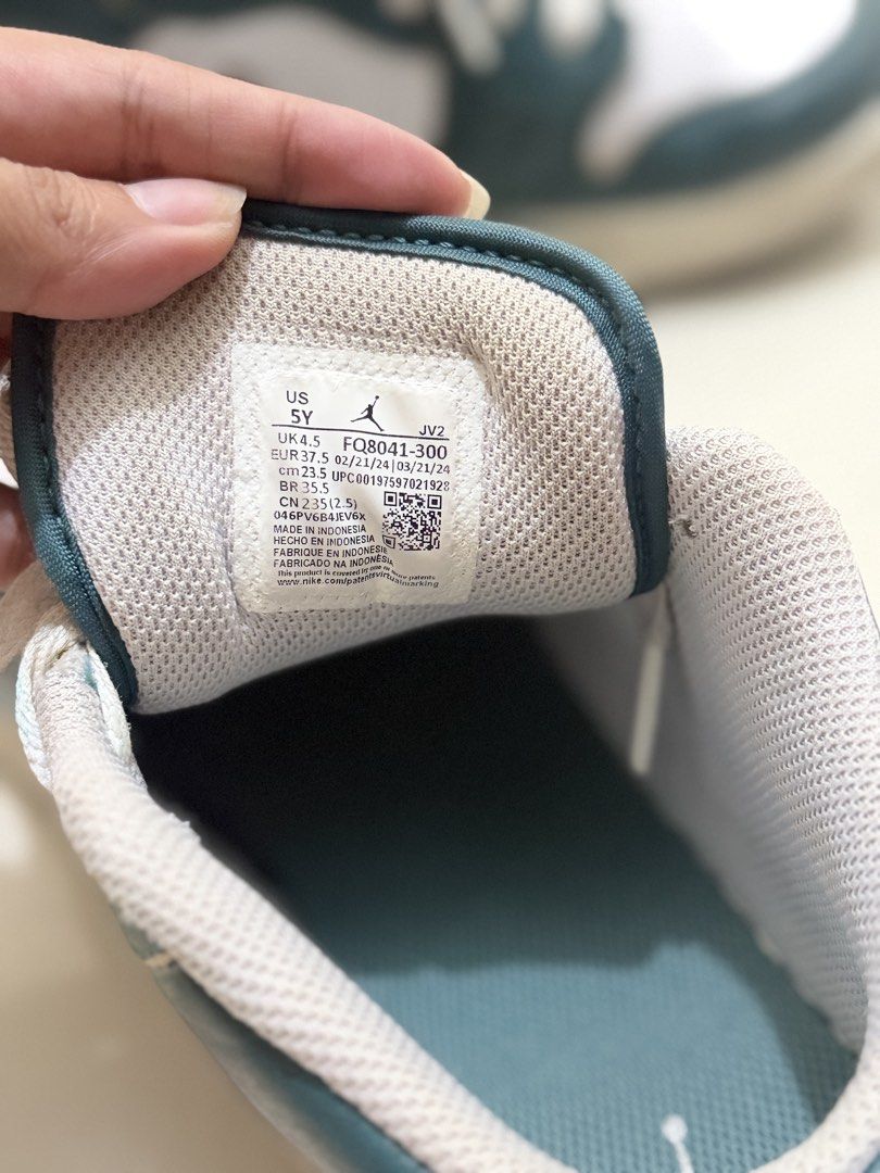 Air Jordan 1 Low SE Pine Green White (Category: Sneakers) located in Manila. Submitted by dnnmrl (Listing ID 1458547811, Image 3). Description: - Air Jordan 1 Low SE - Colorway: Pine Green and White - Size: US 5Y - Condition: Used, with visible wear on soles and toe box - Plenty of life remaining - Please check photos for detailed condition.