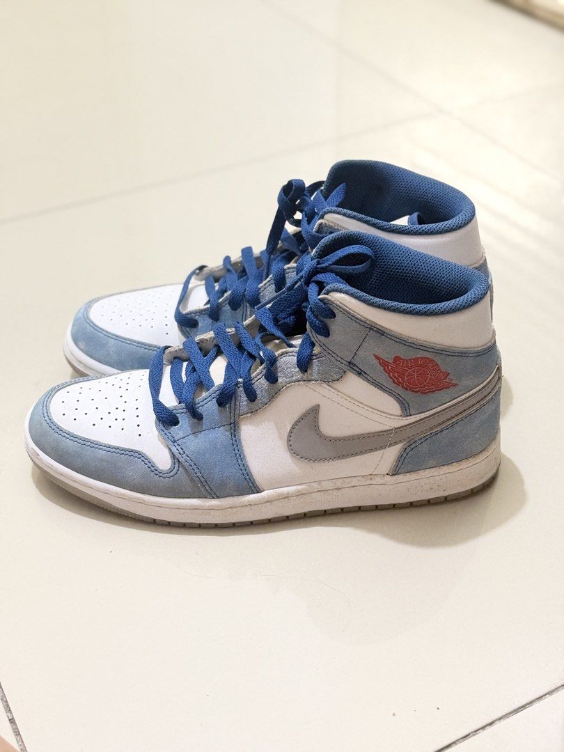 Air Jordan 1 Mid Light Smoke Grey Blue (Category: Sneakers) located in Manila. Submitted by dnnmrl (Listing ID 1458547646, Image 3). Description: - Air Jordan 1 Mid Sneakers - Colorway: Light Smoke Grey and Blue - Size: US 9.5 - Versatile: Great for casual wear or playing basketball - Condition: Shows some signs of wear, but plenty of life left - Iconic Jordan style!.
