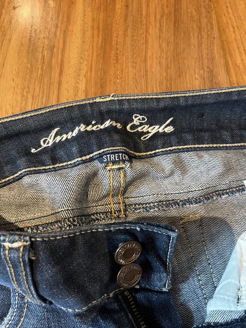 American Eagle Artist Stretch Flare Jeans (Category: Jeans) located in Pasig City. Submitted by d_cluttered (Listing ID 1458649559, Image 2). Description: - Brand: American Eagle - Color: Dark Wash - Style: Flare Leg ('Artist' model) - Size: 0 - Features: Stretch fabric for comfort, button and zip closure, classic five-pocket design - Occasion: Great for everyday wear - Price slightly negotiable .