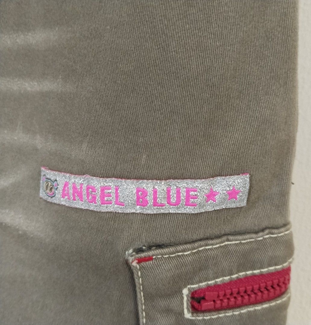 Angel Blue Cargo Skirt - Size S (Category: Skirts) located in Pateros City. Submitted by blashjunks.y2k (Listing ID 1458545273, Image 3). Description: - Cute Angel Blue cargo skirt - Khaki-brown color - Fun embroidery details - Red zipper accents - Angel Blue logo patch included - Size: S - Ideal for a casual and stylish look.