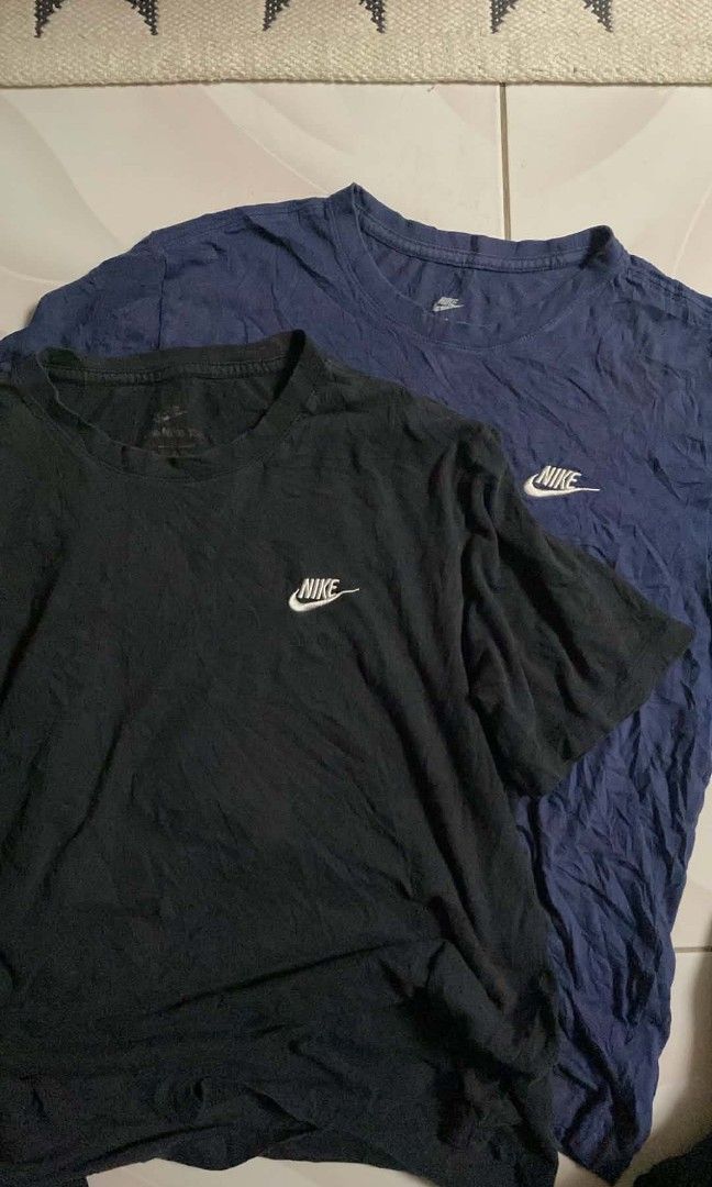 Aspack nike embroidery shirt (Category: Tshirts & Polo Shirts ) located in Cagayan de Oro. Submitted by zekejaena (Listing ID 1458616899, Image 1). Description: Nike embroidery logo shirt(aspack) Nike(black) Dimes(Inches): Width:22 Length:25.5 Color rate:8/10 Issue: signs of usage in neckline (please see pictures for details) Nike (blue) Dimes(inches): Width:22 Length:25.5 Color rate (9/10) Issue: stains,sign of usage and in neckline(please see p