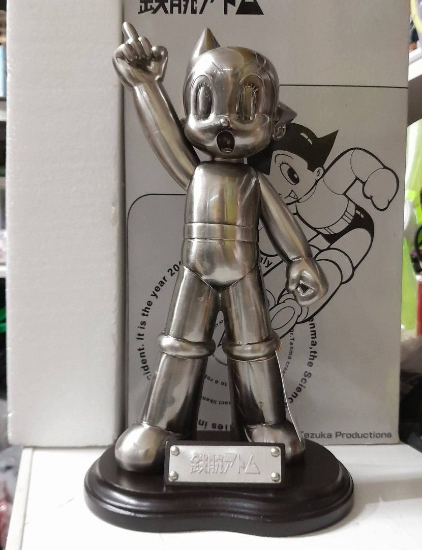 Astroboy Tezuka (Category: Figurines & Statues) located in Baguio. Submitted by shellcollector (Listing ID 1458614048, Image 1). Description: Astro Boy Statue 12" figure metallic finish (Tezuka Productions) Ultra Rare 7500 Pesos Baguio shipping.