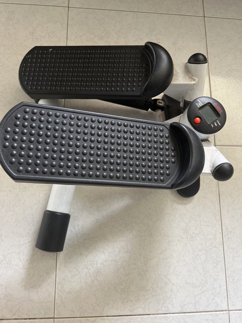 Stepper Machine (Category: Cardio & Fitness Machines) located in Singapore. Submitted by vanscal (Listing ID 1458515982, Image 2). Description: - Compact stepper for home workouts - Digital display tracks steps, time, and calories burned - Sturdy build with textured, non-slip foot pedals - Ideal for cardio and leg toning exercises - Space-saving and easy to store.