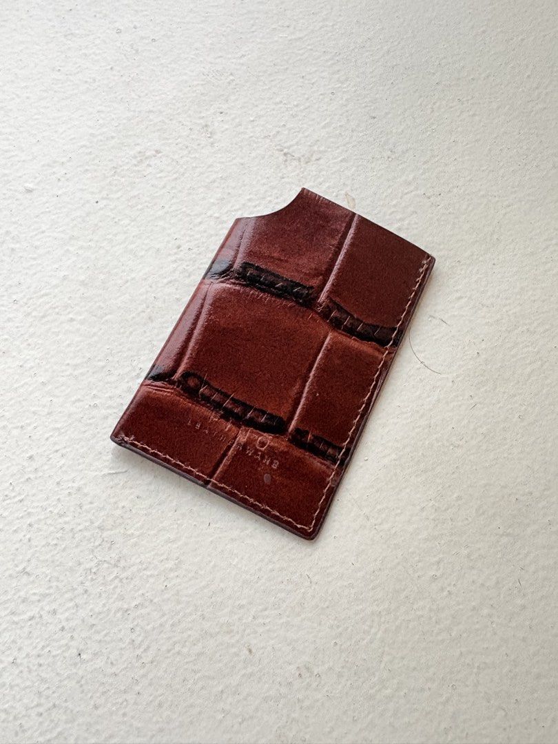 Authentic Fino Leatherware Croc-Embossed Card Holder (Category: Wallets & Card Holders) located in Mandaluyong City. Submitted by wear_your_style (Listing ID 1458544593, Image 1). Description: Store bought. Pinaglagyan lang ng spare card. Croc-embossed genuine leather. Maganda. Parang burgundy-brown ang color. Slim type so it can fit maybe 2-3 cards. Pero nag-eexpand pa yan in time. If you’re the type who don’t bring cash, perfect to for you. RFS