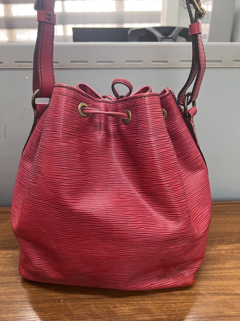 Authentic LV bucket bag in Epi material (Category: Luxury Bags & Wallets) located in Cagayan de Oro. Submitted by riggstuffs (Listing ID 1458527230, Image 2). Description: ➡️ Guaranteed Authentic LV bucket bag ➡️ With code ➡️ condition of the epi material is good, minimal signs of use at the edges but hardly noticeable ➡️ Interior is clean and in suede material ➡️ no other inclusions Riggstuffsis not associated or affiliated with the brand posted