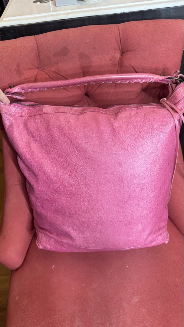 Balenciaga Day Hobo Bag (Category: Luxury Bags & Wallets) located in Tarlac. Submitted by lplc30 (Listing ID 1458620933, Image 2). Description: - Authentic pink Balenciaga day bag -Bag shows signs of usage but remain in good condition - With dustbag .