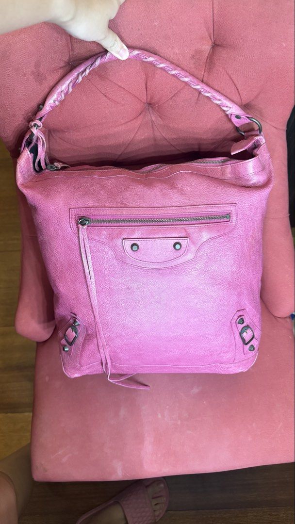 Balenciaga Day Hobo Bag (Category: Luxury Bags & Wallets) located in Tarlac. Submitted by lplc30 (Listing ID 1458620933, Image 1). Description: - Authentic pink Balenciaga day bag -Bag shows signs of usage but remain in good condition - With dustbag .