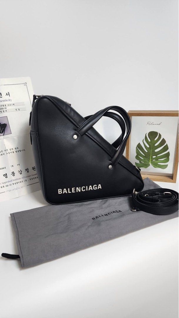 Balenciaga Sling Bag (Category: Luxury Bags & Wallets) located in Quezon City. Submitted by luxeluggagestation (Listing ID 1458669123, Image 1). Description: 💯% Authentic money back if proven fake Super light weigh calf leather material BALENCIAGA sling bag Comes with COA With dust bag and booklets .