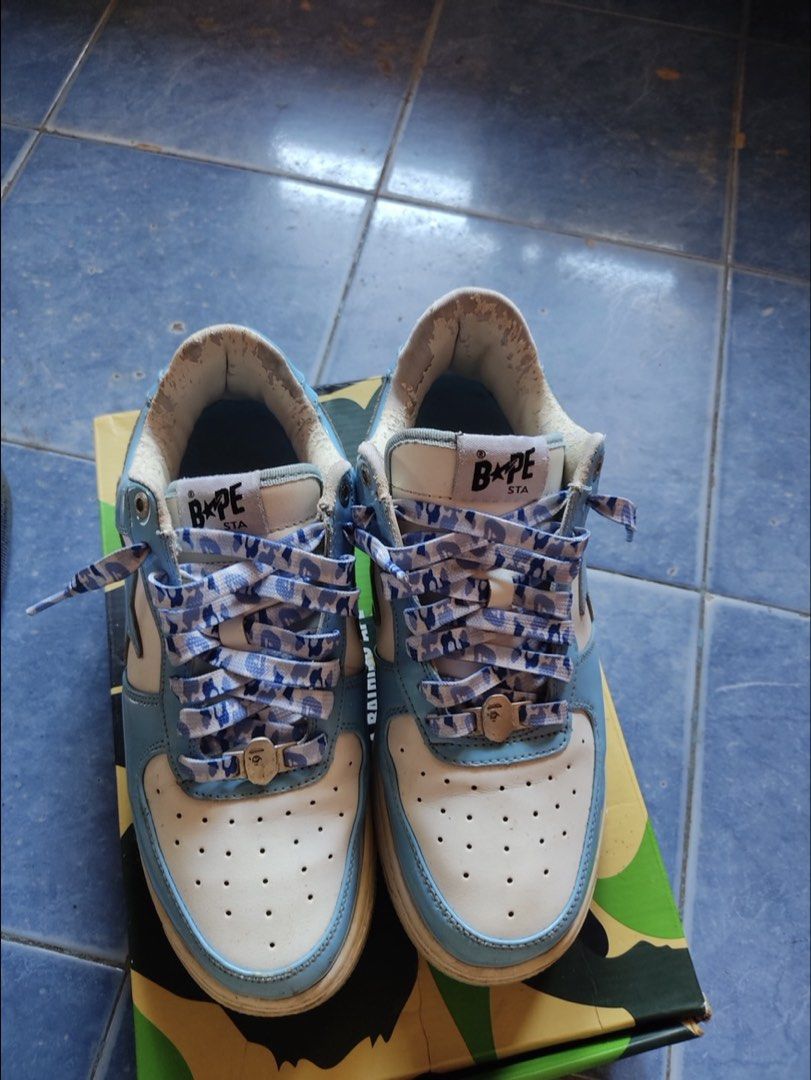 BAPE STA Low Light Blue White (Category: Sneakers) located in Angeles City. Submitted by kielsthrift (Listing ID 1458544647, Image 3). Description: - BAPE STA Low sneakers - Color: Light Blue and White - Features classic BAPE star logo - Laces have unique BAPE pattern - Comes with original box - Authentic and stylish footwear.