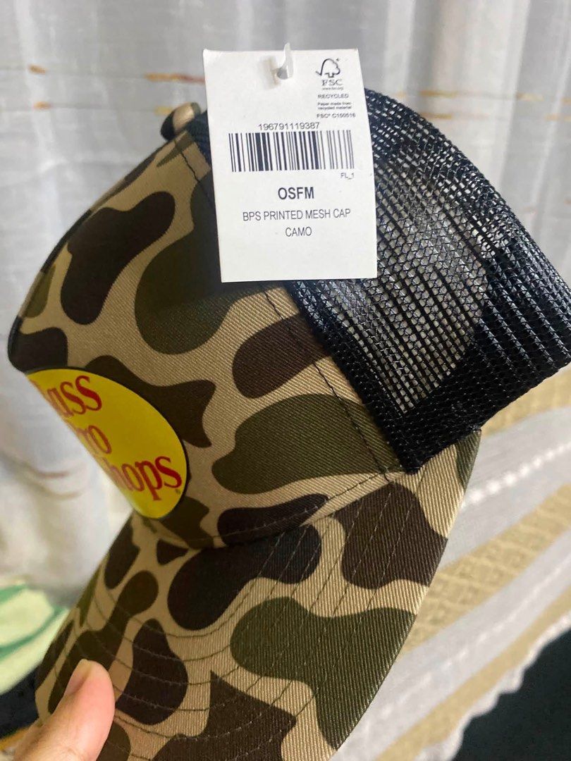 Bass Pro Shops Camo Mesh Trucker Cap OSFM (Category: Caps & Hats) located in Pasig City. Submitted by rieperez (Listing ID 1458504569, Image 2). Description: - Bass Pro Shops trucker cap - Features classic logo and camouflage pattern - Mesh back for enhanced breathability - One size fits most design - Ideal for outdoor adventures or everyday casual style.