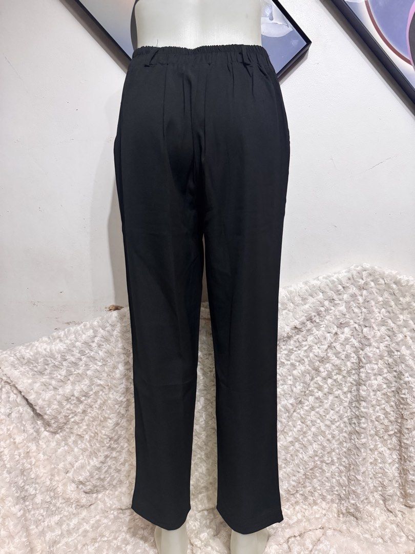 Black High Waisted Tailored Pants (Category: Other Bottoms) located in Marikina City. Submitted by lorradel (Listing ID 1458670610, Image 3). Description: - W 28-30 in /L- 35in - Classic black tailored pants - High-waisted design with comfortable elastic back - Flattering straight leg cut - Functional side pockets - Secure button and zip front closure - Versatile for both work and casual outfits - Effortless to style for any occasion - may have s
