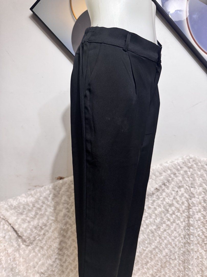 Black High Waisted Tailored Pants (Category: Other Bottoms) located in Marikina City. Submitted by lorradel (Listing ID 1458670610, Image 2). Description: - W 28-30 in /L- 35in - Classic black tailored pants - High-waisted design with comfortable elastic back - Flattering straight leg cut - Functional side pockets - Secure button and zip front closure - Versatile for both work and casual outfits - Effortless to style for any occasion - may have s