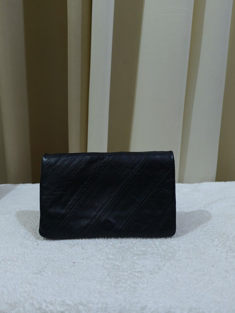 Black Leather Wallet with Multiple Compartments (Category: Wallets & Card holders) located in Makati City. Submitted by prelovedtreatedwithlove (Listing ID 1458589630, Image 1). Description: - Black leather wallet - Zip pocket inside - Multiple card slots - Clear ID window - Secure snap closure - Functional, unique wallet - quadfold,. Medium size -Genuine leather - No issue like new.