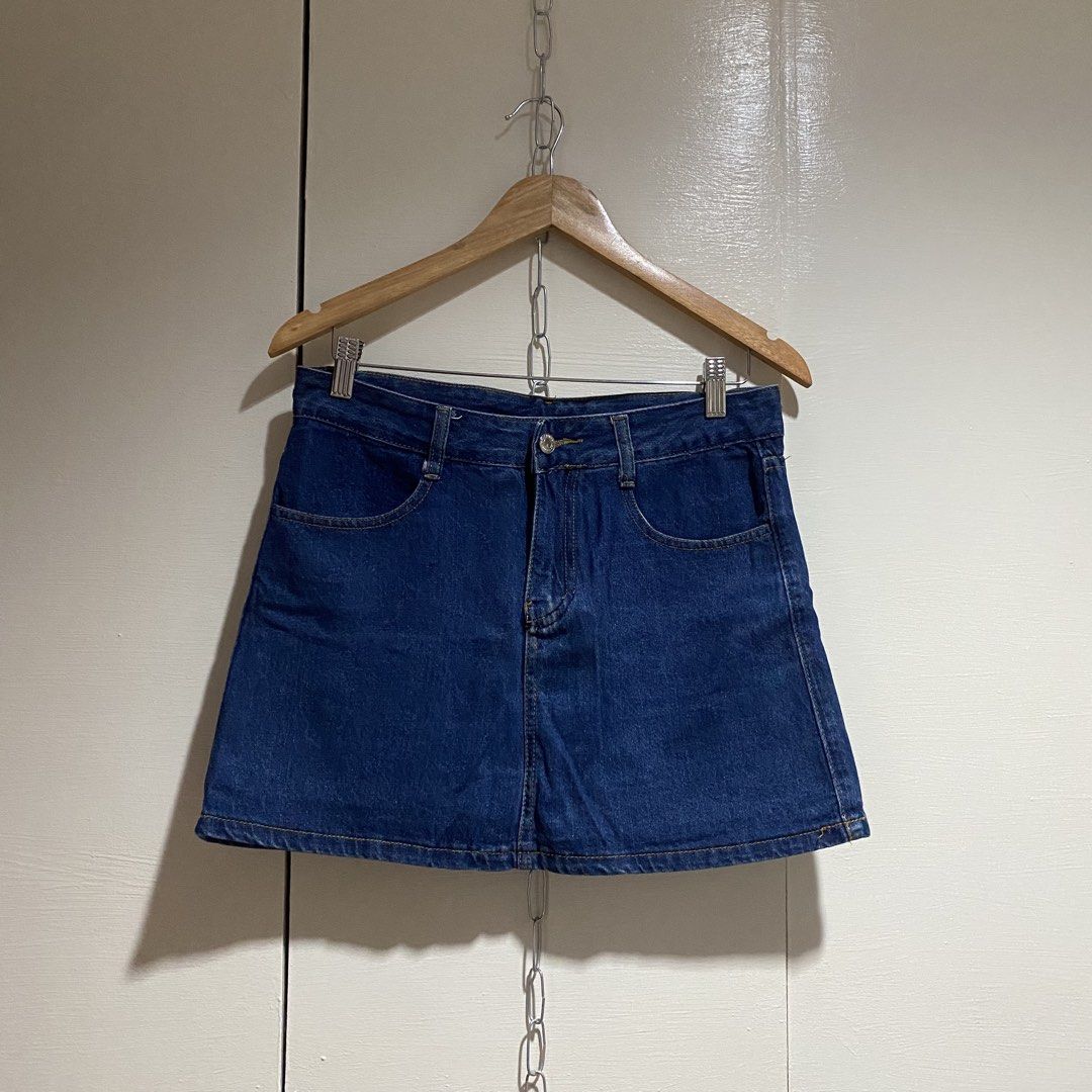 Blue Denim A-Line Mini Skirt (Category: Skirts) located in Cavite. Submitted by branchee_chic (Listing ID 1458572026, Image 1). Description: W:29-30 L: 14.5 Nawala yung puller bg zipper pls see photos - Classic blue denim mini skirt - A-line cut - Two front pockets - Two back pockets - Zipper and button front closure - Versatile and easy to style.