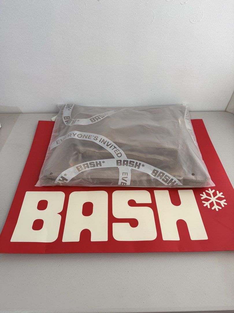 BRAND NEW BASH Packing Cubes Set - Taupe (Category: Luxury Bags & Wallets) located in Las Pinas. Submitted by tati_finds (Listing ID 1458671420, Image 1). Description: Brand new, comes with BASH Paper bag, perfect for gifting -No Issue, No signs of use -Selling at SRP Selling a set of BASH packing cubes. Comes in a Taupe color. Includes multiple sizes for organizing your luggage. Mesh panels on top for visibility. Zippers work smoothly. Great for