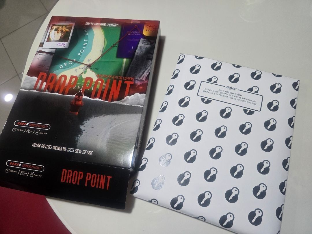 BREAKOUT DROP POINT DETECTIVE MYSTERY GAME (Category: Board Games & Puzzles) located in Manila. Submitted by hwong1 (Listing ID 1458634093, Image 1). Description: - Drop Point board game for sale - Immersive detective experience: Follow clues to solve the case - Player count: 1-4 players - Age recommendation: 15+ - Game time: Approximately 90-120 minutes - Includes a separate booklet.
