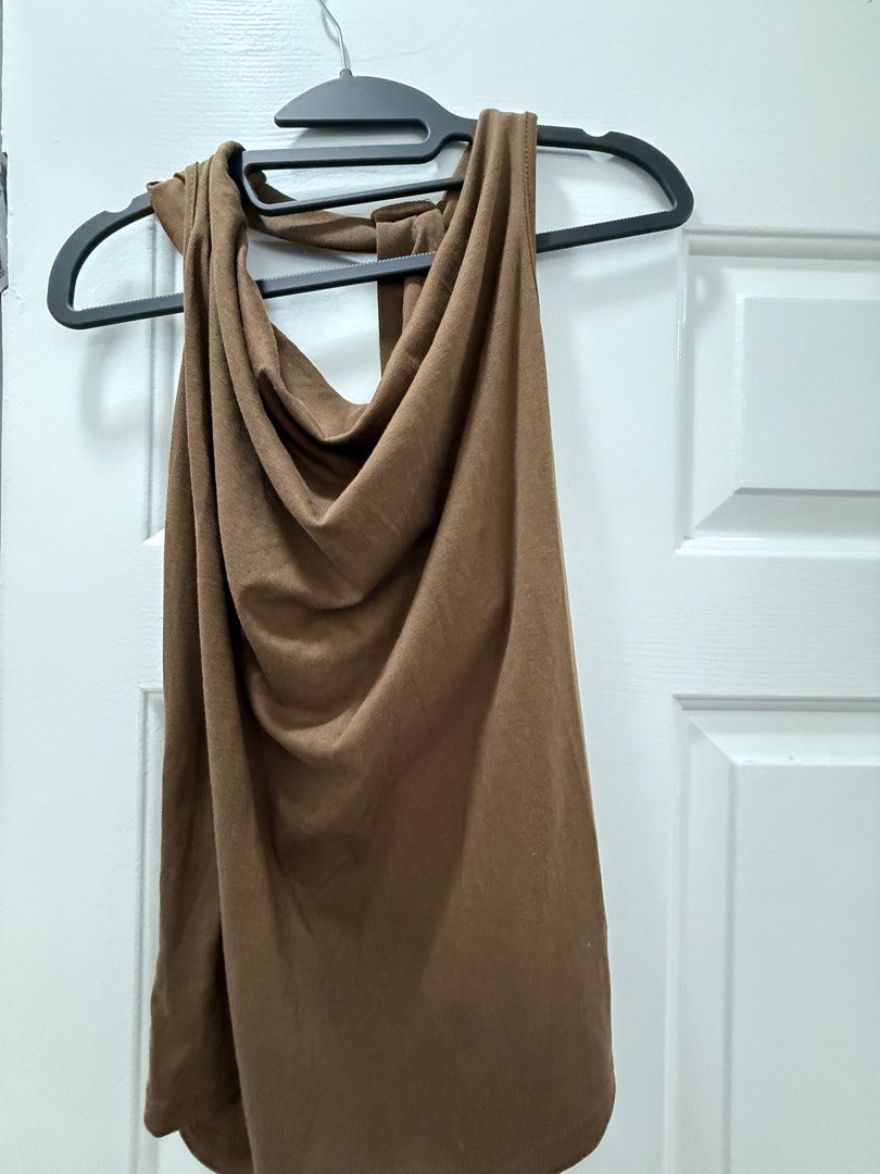 Brown Draped Top and Wide Leg Pants Set (Category: Sets or Coordinates) located in Pasig City. Submitted by atbp__ (Listing ID 1458556994, Image 2). Description: - Comfy brown set - Top features a draped neckline and tie-back detail - Pants are wide-leg with an elastic waistband and pockets - Made from soft, flowy fabric - Ideal for casual wear or lounging - Versatile: pieces can be styled separately.