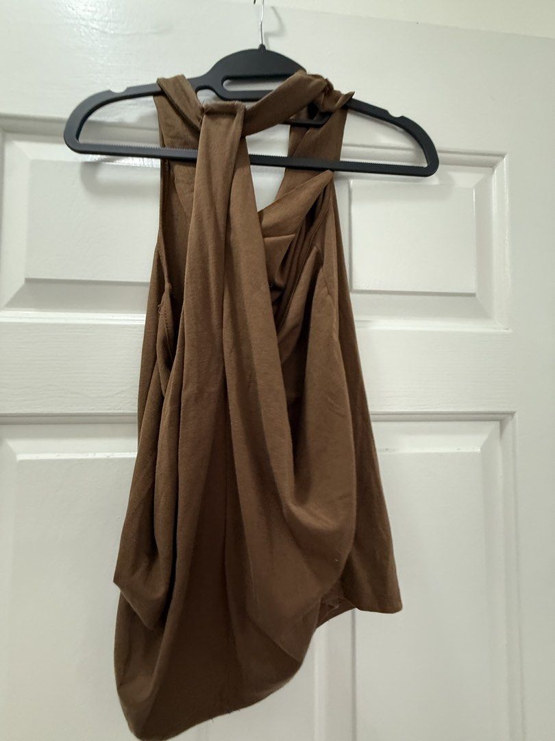 Brown Draped Top and Wide Leg Pants Set (Category: Sets or Coordinates) located in Pasig City. Submitted by atbp__ (Listing ID 1458556994, Image 3). Description: - Comfy brown set - Top features a draped neckline and tie-back detail - Pants are wide-leg with an elastic waistband and pockets - Made from soft, flowy fabric - Ideal for casual wear or lounging - Versatile: pieces can be styled separately.