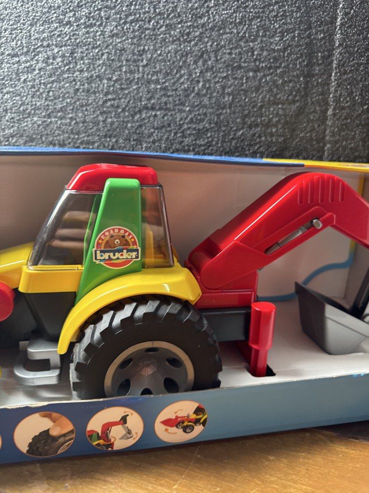 BRUDER Roadmax Backhoe Loader (Category: Kids Toys) located in Manila. Submitted by furimmerschatz (Listing ID 1458570409, Image 3). Description: Bruder Roadmax Backhoe Loader. Suitable for children aged two years and older. Bruder tractor with fully functional front loader and backhoe. Also including an extending stabliser for those awkward areas! Complete with with soft rubber tyres. Scale:1:16 Size: 585mm x 183mm x 185mm Strong and sturdy, ide