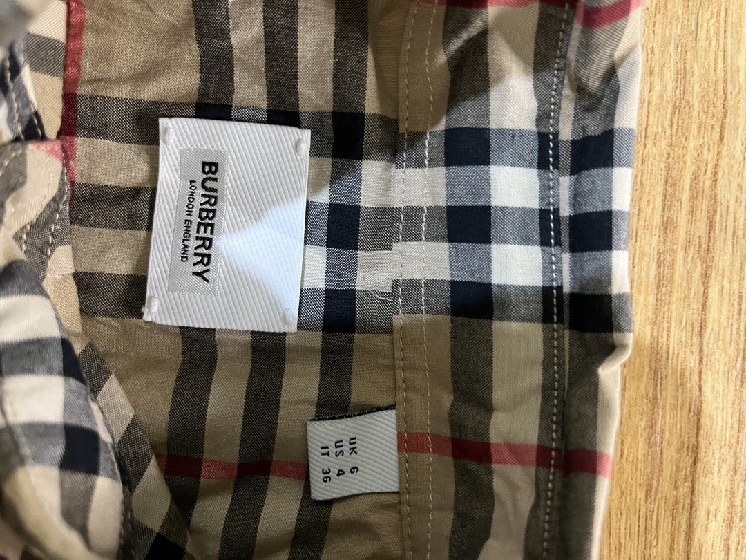 Burberry plaid button down (Category: Others Tops) located in Zamboanga. Submitted by alterramz08 (Listing ID 1458679523, Image 3). Description: Burberry nova plaid button down Size small Width 18 length 26-27 Excellent Condition Price ; 500 Pesos.
