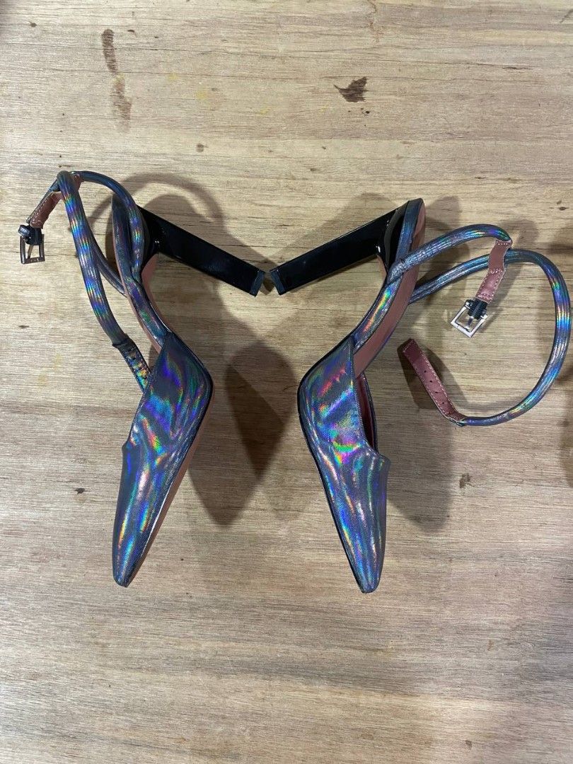 Call It Spring Khelani Holographic Ankle Strap Heels (Category: Heels) located in Manila. Submitted by chichaico (Listing ID 1458608830, Image 2). Description: - Brand: Call It Spring - Style: Holographic Heels - Closure: Ankle strap with buckle - Toe: Pointed toe - Material: Iridescent shimmer, holographic effect - Comfort/Sustainability: Features B.E.D Foam (sustainable & vegan) - Occasion: Great for dressing up outfits - Used twice only - Very