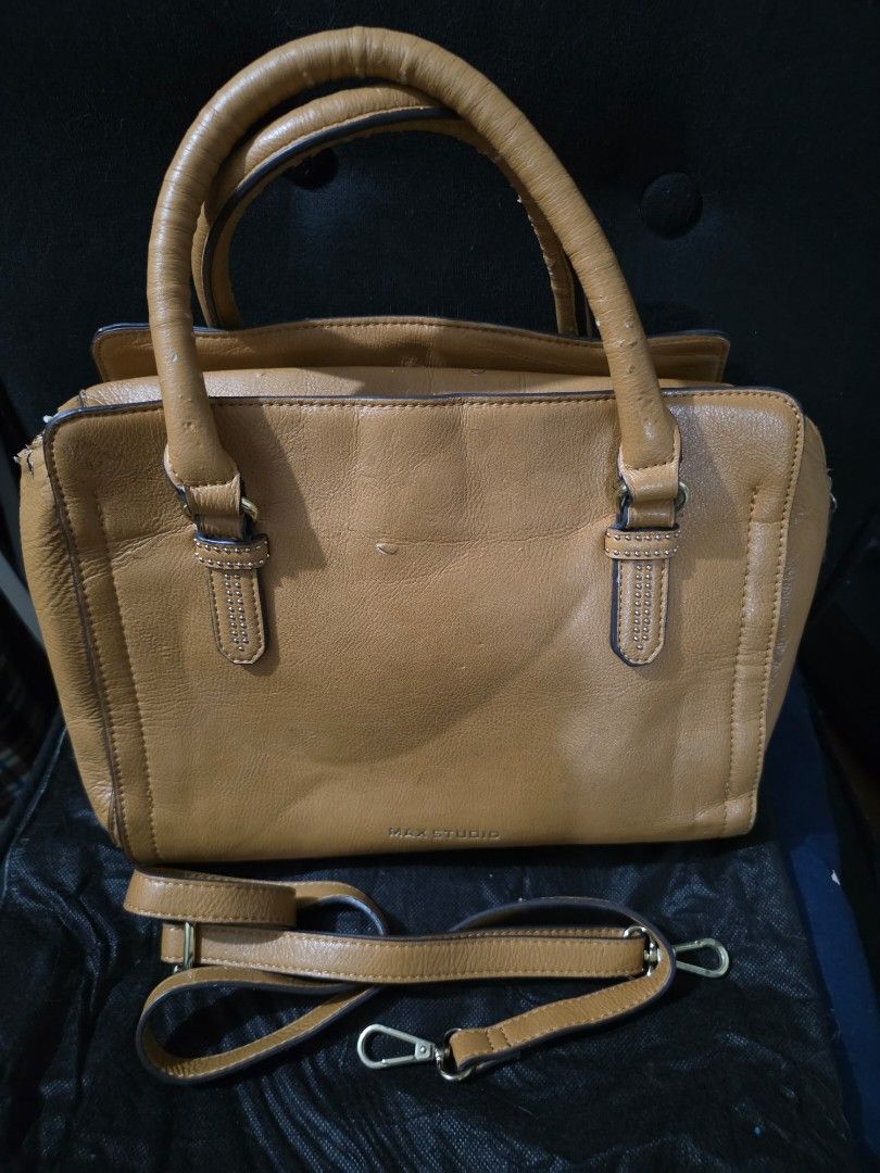 Camel Leather 2 way Bag (Category: Shoulder Bags) located in Quezon City. Submitted by cottoncandyqc (Listing ID 1458679620, Image 1). Description: includes strap for cross body or shoulder bag use lining and inner pockets mint condition support, rivets, zippers and other hardware still shiny with luster some scratches/peel in leather corners but not halata especially when worn cubao qc for lalamove j&t .
