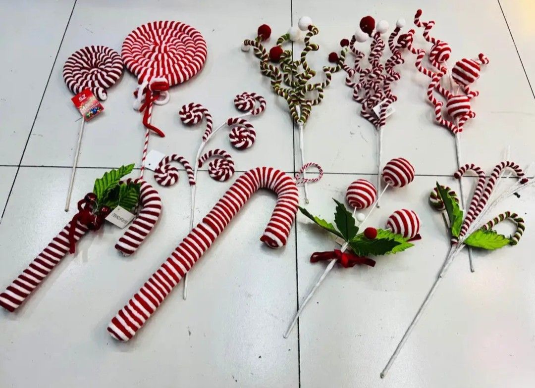 Candy Cane & Lollipop Christmas Tree Ornaments Set (Category: Other Home Decor) located in Manila. Submitted by mecagani (Listing ID 1458649309, Image 2). Description: - candy cane and lollipop themed Christmas tree ornaments. - Includes various sizes and designs for a festive candy land theme. - Features large candy canes, lollipops, and smaller swirl candies. - Adds a sweet touch to your holiday decor..