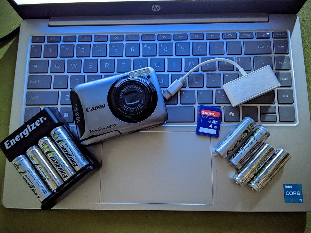 CANON A940 DIGICAM (Category: Cameras) located in Manila. Submitted by calmpenguin_c53e0e (Listing ID 1458563460, Image 2). Description: DETAILS : all working 1,600 + sf 1550 if sure buyer INCLUSIONS : ON THE PIC - old batteries - sd card - card reader ISSUE : buttons glitching (still usable and can be repaired for a cheap price) battery lock slightly loose. buy at your own risk. lalamove. pm for sample photos..