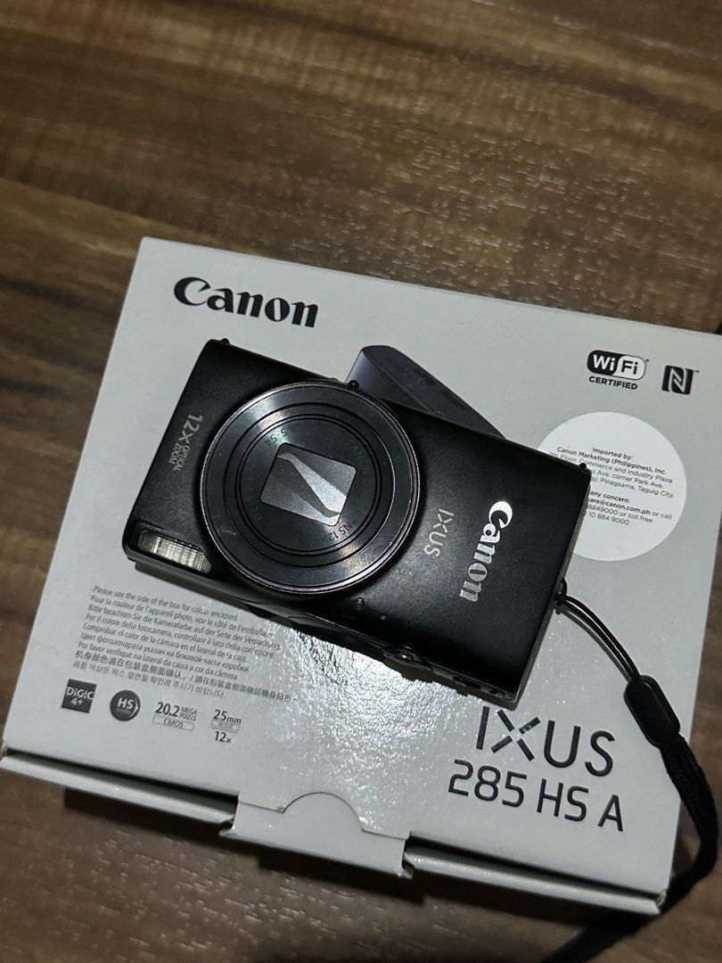 Canon IXUS 285 HS A Digital Camera (Category: Cameras) located in Quezon City. Submitted by lovedbyssy (Listing ID 1458631350, Image 1). Description: - Canon IXUS 285 HS Digital Camera - 20.2 Megapixels resolution - 12x Optical Zoom - Full HD Video Recording - Built-in Wi-Fi for easy sharing - Comes with charger and original box - Ideal for everyday photos and travel Slightly negotiable, open for meet up.