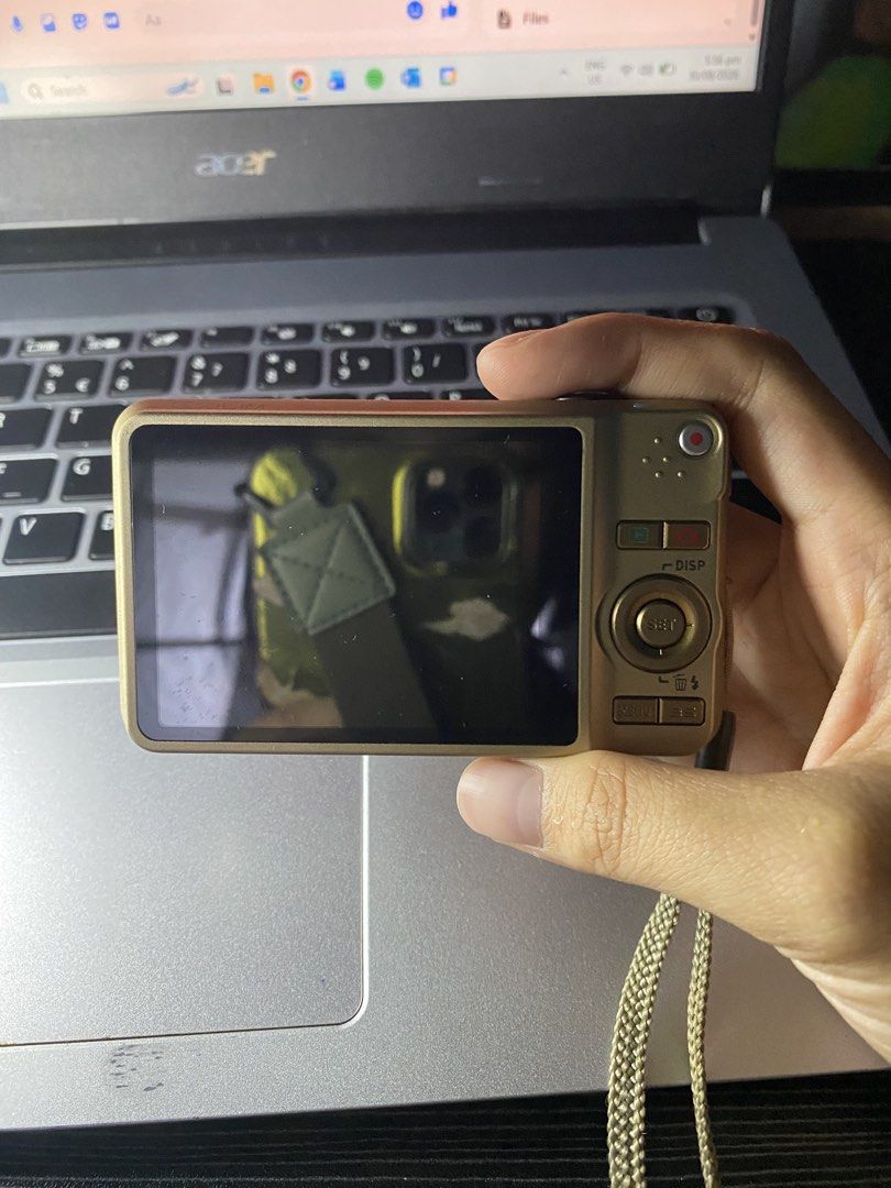 Casio EXILIM (Category: Cameras) located in Bacoor. Submitted by zsdeclutting (Listing ID 1458602413, Image 1). Description: Gold Casio Exilim RFS: Decluttering, Family Owned Flash working Buttons working Cosmetics 9/10 ISSUE: - may mga tiny black dots sa screen, it doesn’t really affect anything tho. Inclusions: New Battery SD Card Lanyard The Cam Itself Original Charger (working, but need sya sa pinaka top ilalagay, can’t explain clearly, I can