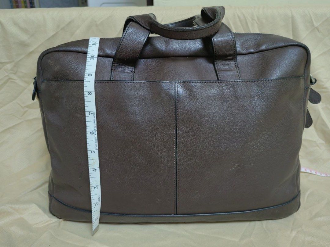 Coach Dark Brown Leather Briefcase (Category: Briefcases) located in Manila. Submitted by junejanuary (Listing ID 1458499190, Image 2). Description: - Classic Coach dark brown leather briefcase - Classic design with top handles - Secure zip closure - Spacious interior for work essentials - Beautiful leather patina developed over time - A durable and reliable bag for daily commutes.
