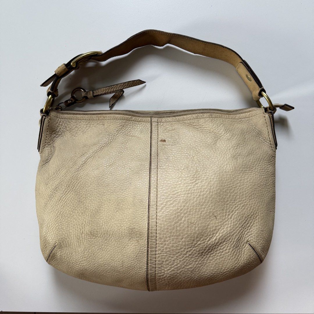 Coach soho cream pebble (Category: Luxury Bags & Wallets) located in Cavite. Submitted by kalebfindsluxs (Listing ID 1458683390, Image 1). Description: Coach soho cream pebble Good Sign of usage Leather rubs scratches Check details - 2280 + sf Loc cavite Jnt / lalamove.