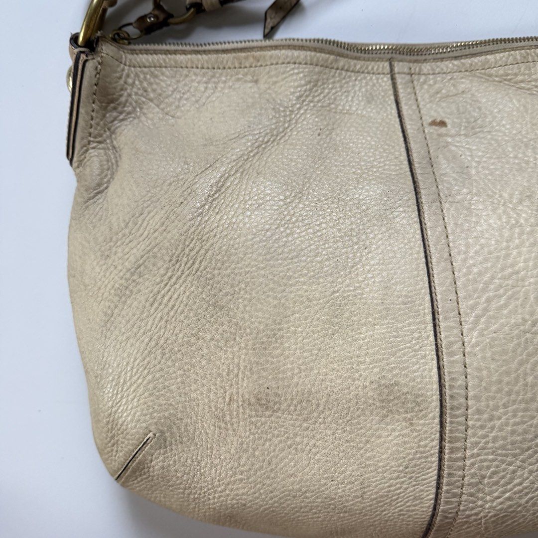 Coach soho cream pebble (Category: Luxury Bags & Wallets) located in Cavite. Submitted by kalebfindsluxs (Listing ID 1458683390, Image 3). Description: Coach soho cream pebble Good Sign of usage Leather rubs scratches Check details - 2280 + sf Loc cavite Jnt / lalamove.