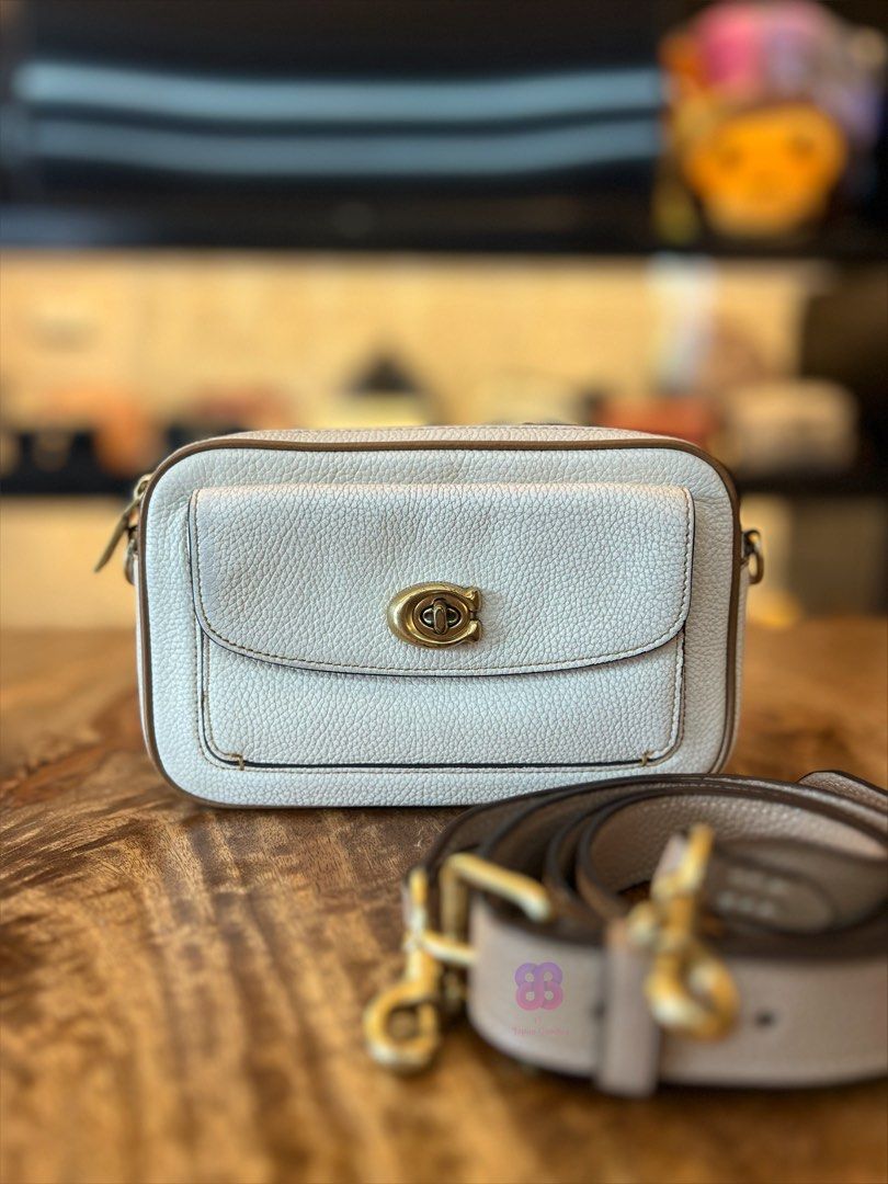 Coach Willow Camera Bag (Category: Cross-body Bags) located in Las Pinas. Submitted by jhind_ (Listing ID 1458570633, Image 1). Description: In good condition (leather shows signs of use) Bought in Japan Please see photos for details. Thank you..