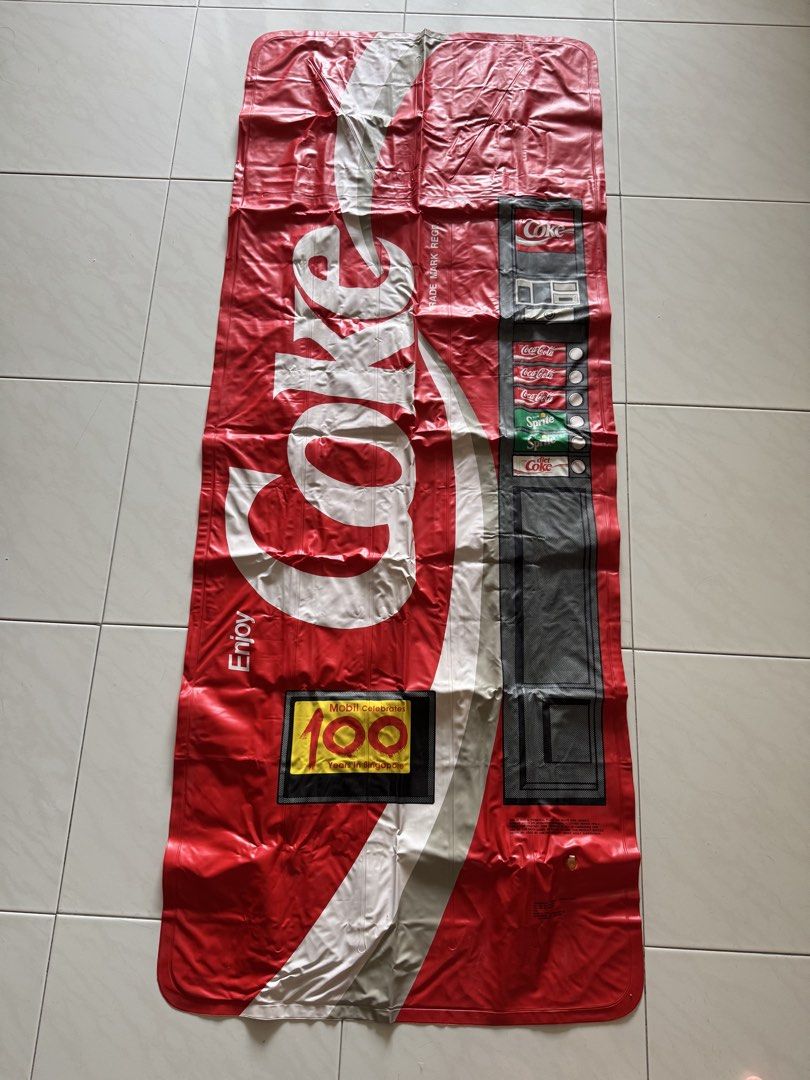 Coca-Cola Pool Float (Category: Other Sports Equipment and Supplies) located in Singapore. Submitted by ndabsolute (Listing ID 1458564463, Image 1). Description: - Vintage Coca-Cola Pool Float - Special Edition: Celebrates Mobil's 100 Years in Singapore - Heavy Gauge I-Beam Construction for durability - Dual Chamber Design with built-in pillow - Resists Salt and Sun damage - Size: 72" x 30" (deflated) - Made in China under license from The Coca-C